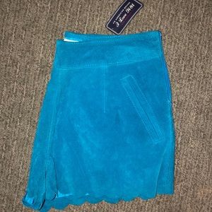 I LOVE H81 blue suede scalloped edge shorts
